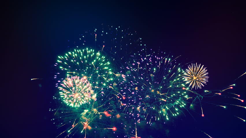 Exploding fireworks in the night sky. | Shutterstock HD Video #1014375086