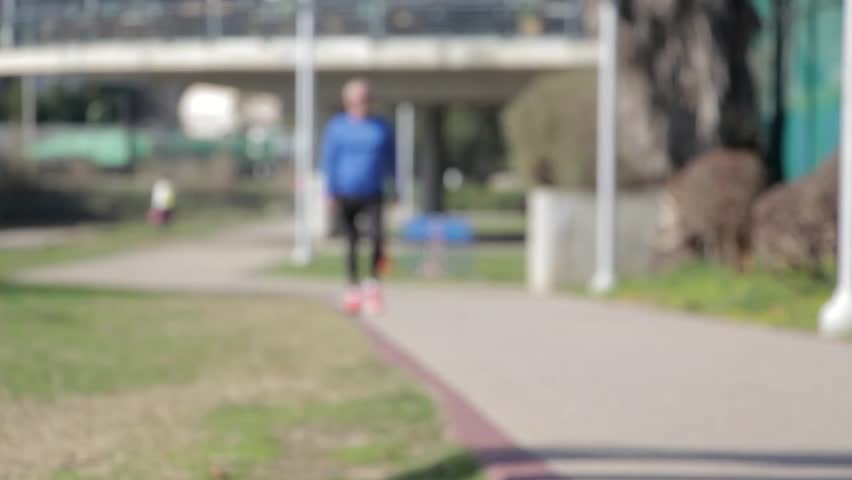 park stroll walking people bokeh