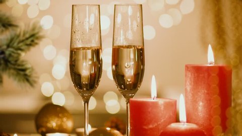 Cinemagraph - Christmas and New Year holiday table setting with champagne. Celebration.  Holiday Decorations. Living foto.