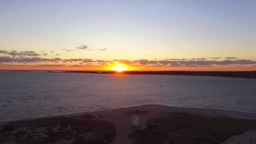 Aerial shot of a beautiful sunrise over the lighthouse in Edgartown, Martha's Vineyard, Massachusetts