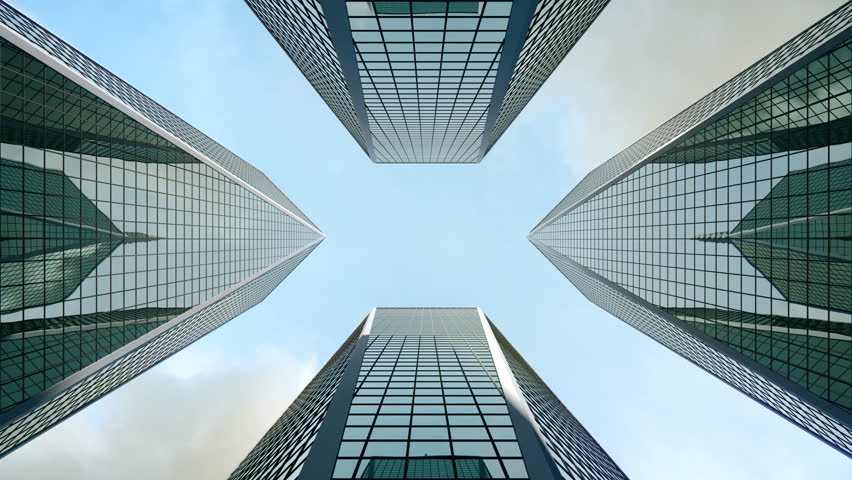 Bottom view airplane flying over high rise office buildings and reflects in glass modern facades. 
Corporate city centre buildings central composition. Royalty-Free Stock Footage #1014411404