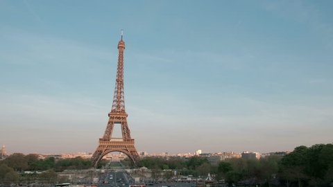 Sweeping camera panoramic pan right view of Eiffel Tower from the Trocadero late afternoon in Paris, France