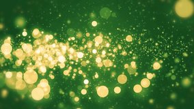 Green light shine particles bokeh, holiday concept. Christmas animated gold background with circles and stars. Space background. Screen green. Seamless loop.