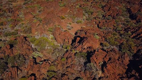 Aerial view of the Teide National Park, flight over the mountains and hardened lava. Tenerife, Canary Islands.
