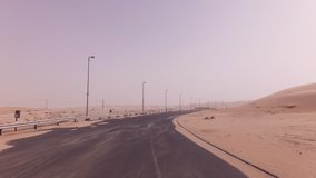 New road from Oasis Liwa to the Moreeb Dune in Rub al Khali desert stock footage video
