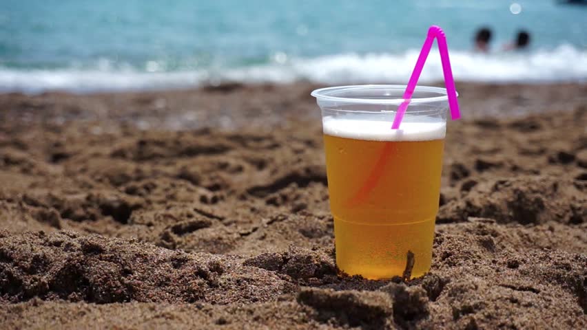 Beer on the sand beach.