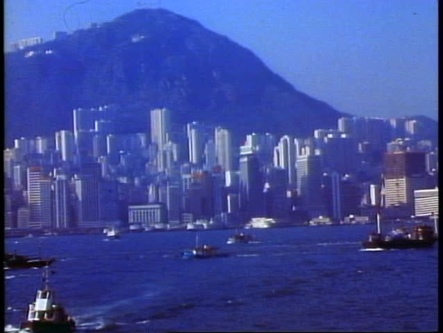 HONG KONG, CHINA, 1982, Hong Kong skyline and harbor with boats everywhere