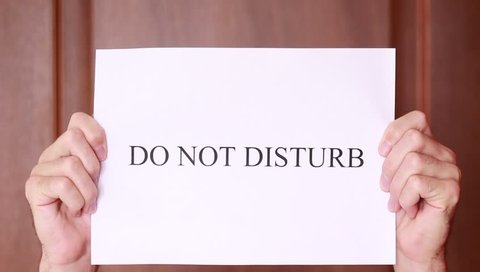"Do not disturb" in male hands