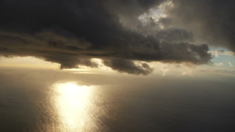 High quality video of stormy clouds above the ocean in 4K slow motion 60fps