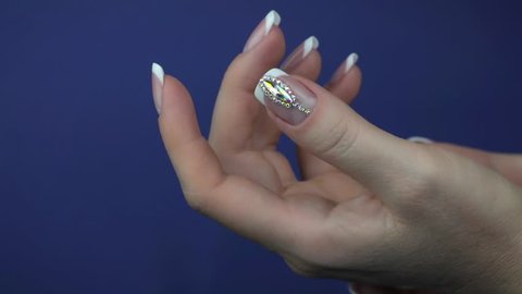 Stylish trendy female manicure. Beautiful Nail Art Manicure. Nail designs with decoration.