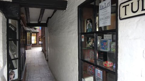 Lichfield, Staffordshire, England - June 19, 2018. View of Tudor Row with small shop and cafe in historical old city Lichfield.