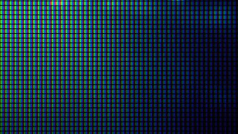 Macro glowing liquid crystal structure of the IPS-matrix of the graphic monitor with visible burning pixels and patterns
