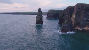 Drone Footage Of Rock Formations Amidst Against Cloudy Sky 4K