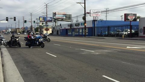 Los Angeles, California, USA, August 2, 2018: Group of bikers riding American motorbikes Harley Davidson 