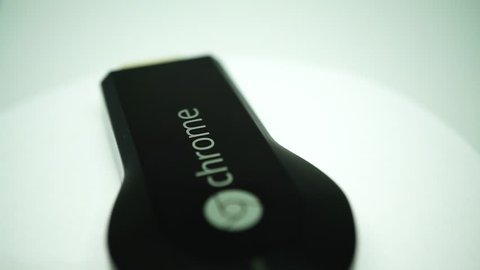 Rome, 03 August 2018: Rotating view of the first model of Google Chromecast HDMI-Dongle ,celebrating its first 5 years
