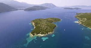 Stunning aerial video of Thilia island in Greece. In distance is famous Scorpios island, from the left side is Lefkada island and from right is a part of Meganisi island. Filmed in 4K resolution. 