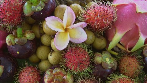 Assortment of Exotic Tropical Thai Fruit Including Rambutan, Dragonfruit, Longan, Mangosteen and Mango