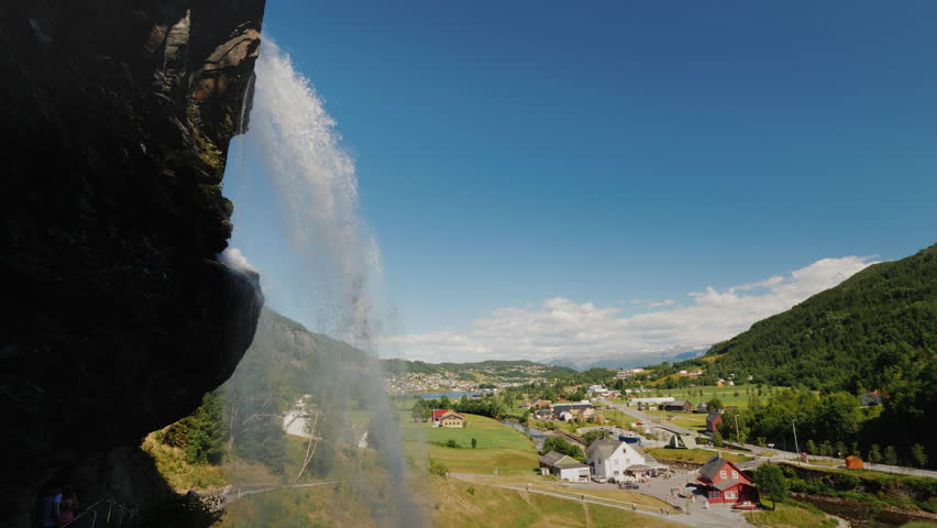 The majestic Steinsdalsfossen is a waterfall located 2 kilometers from the town of Nurheimsund. In the valley below there is a hawking village