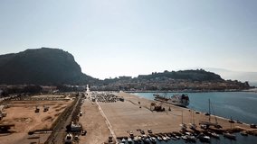 Aerial view of small port/shipyard with Greek Navy.