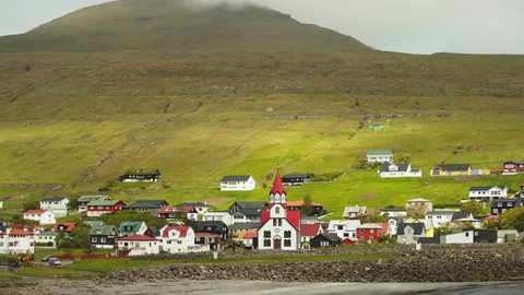 Sandavagur Village and Sandavagur Evangelical Lutheran Church, Island of Vagar, Faroe Islands, Danmark,  Tilt Up