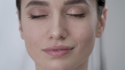 Face Care. Attractive Woman Touching Skin Under Eyes Closeup