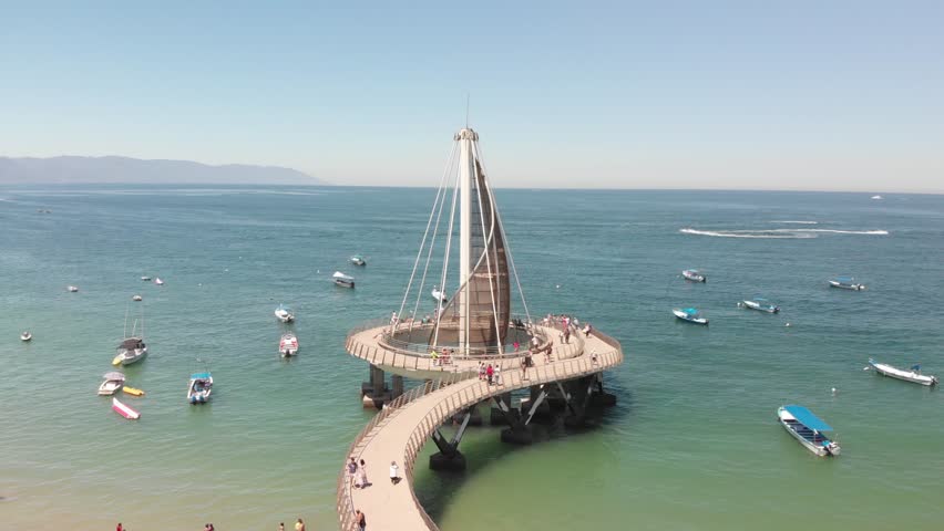 Hovering in front of the Pier at Playa Los Muertos in Puerto Vallarta, Jalisco.
