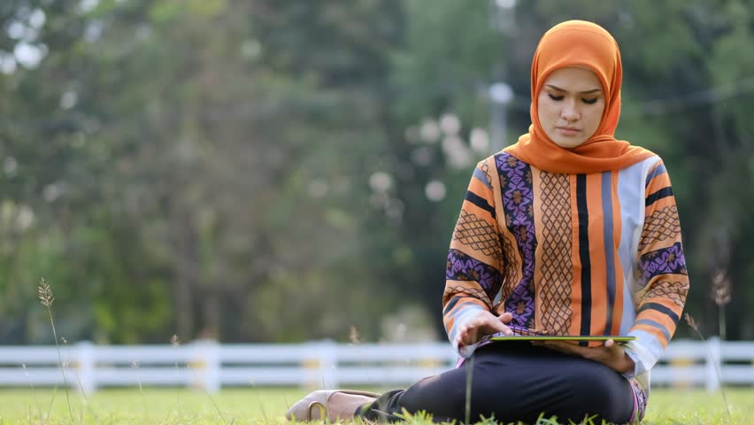 Portrait of Malay woman in park