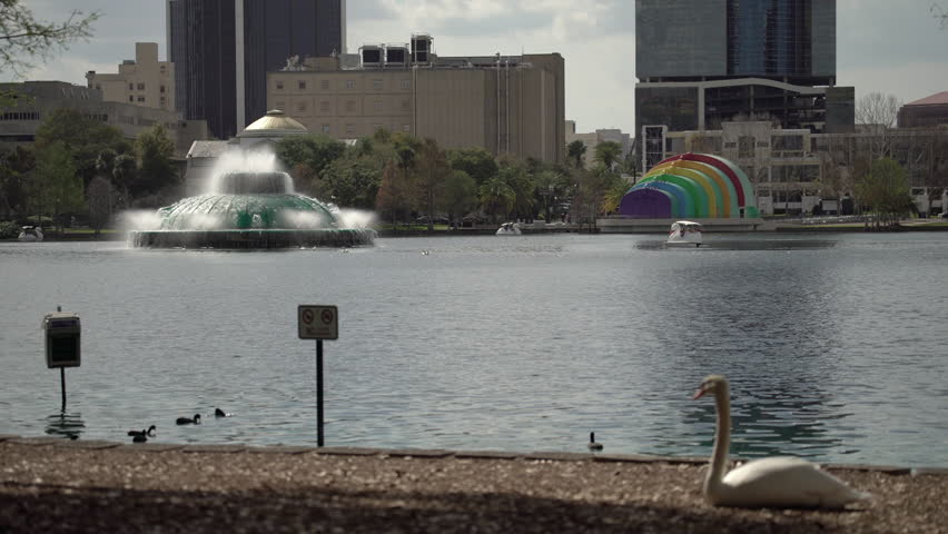Orlando, United States - May, 2017: Springing fountain and the Disney Amphitheater in Lake Eola Park