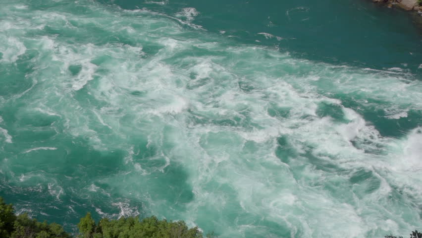 Raging Whitewater Rapids on Niagara River. View from above looking down into the Niagara Gorge with raging river.