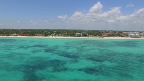 Aerial Shot from ocean to shore 4k of Caribbean Playa del Carmen Playacar 