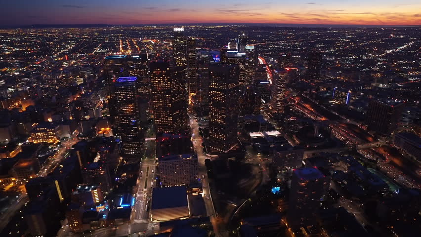 Connected aerial view of the Financial District in Downtown Los Angeles, California. Internet of things. Circuit boards. Famous skyscrapers and freeway full of cars. Futuristic. Technology. Royalty-Free Stock Footage #1014661181