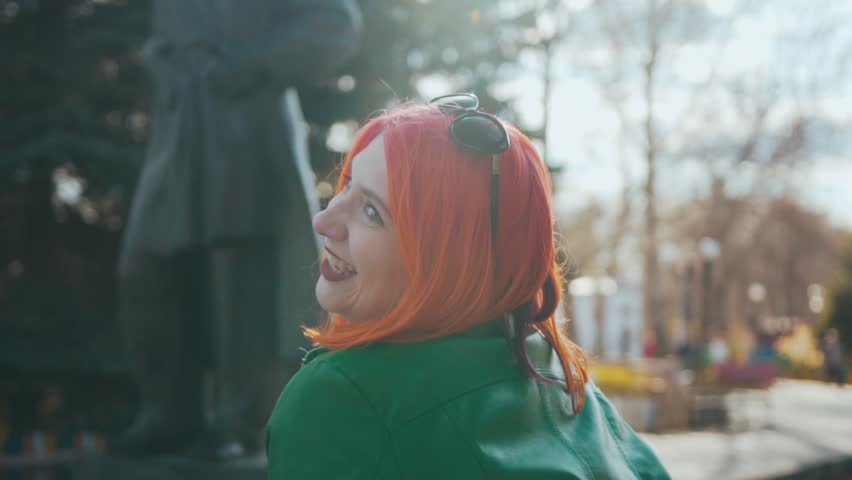 Redhead girl in the park