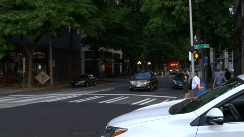 Seattle, Washington, July 2018.  Firetruck paramedic with lights and siren drives to emergency in downtown Seattle.
