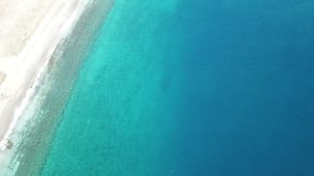 Aerial drone footage beach, coastline and blue sea 