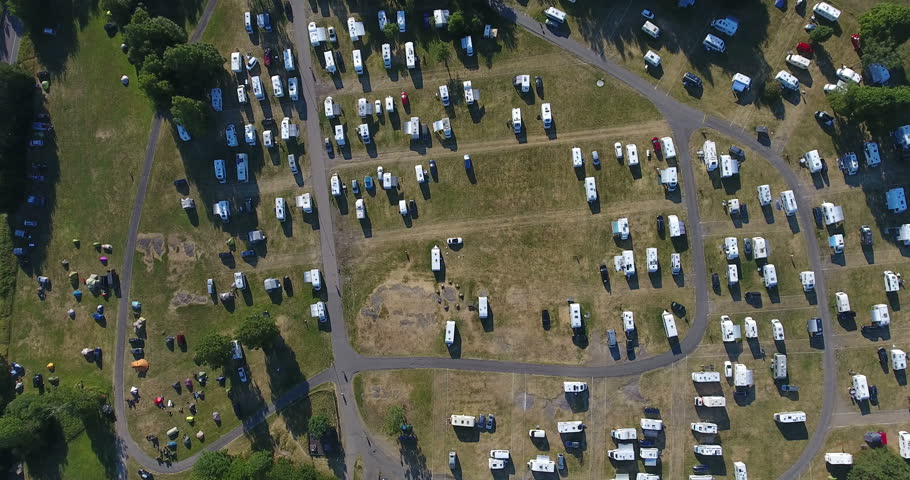 Top view at pure drop in area with campers, caravans in campsite. Camera down. The Ekeberg, Oslo, Norway