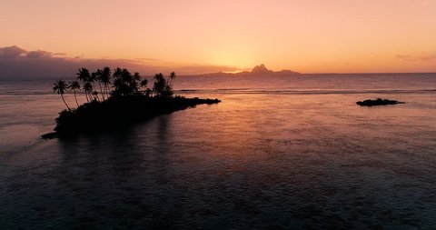 sunset with lagoon in French Polynesia, aerial view