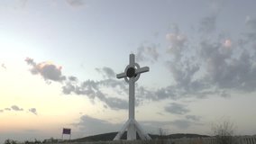 Zoom in video on Worship Cross near Anapa city at sunrise, Black sea, Russia