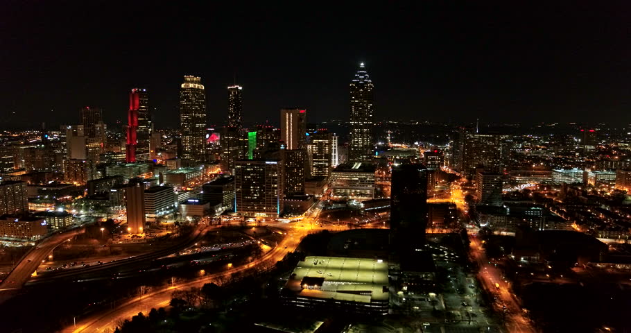 Atlanta Aerial v390 Flying low backwards away from downtown 1/18