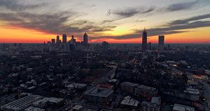 Atlanta Aerial v381 Flying backwards over Ponce City Market with cityscape, sunset view 1/18