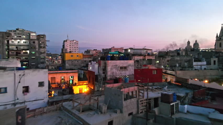 Cuba Havana v11 Flying extremely low over Old Havana with vivid colorful building scenery at dusk 4/18