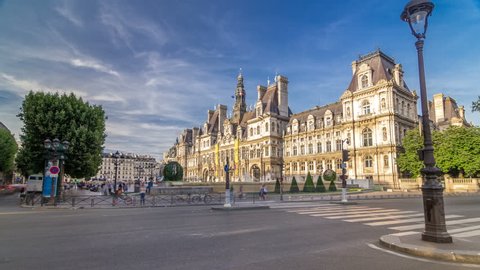 Hotel de Ville or Paris city hall timelapse hyperlapse in sunny day. Traffic on the road. This building has been used as the location of the municipality of Paris since 1357