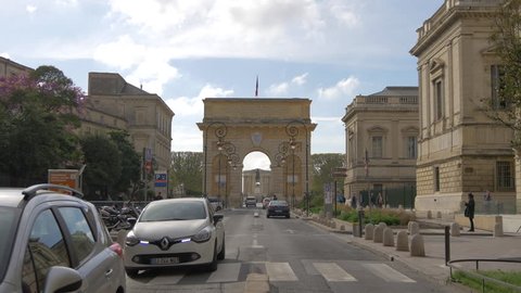 Montpellier, France - April, 2017: Driving on Rue Foch, near Porte Du Peyrou.