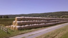 Flying along stacked hay bales