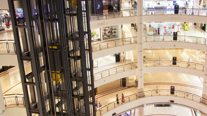 Shopping mall floors with elevators time lapse