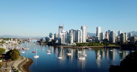 Beautiful aerial view of false creek marina with Vancouver skyline in background