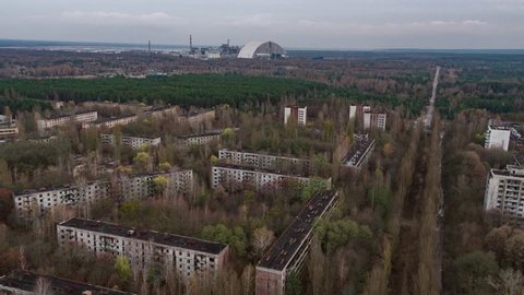 Aerial of Chernobyl Nuclear Power Plant sarcophagus and Pripyat city. 