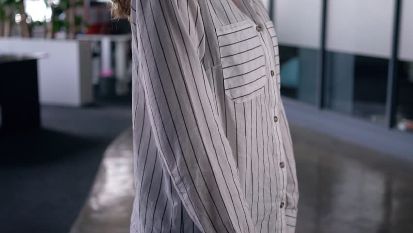 Hardworking intern smiling after a sucessful day