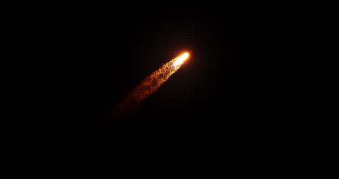 Rocket flying into space at night with bright exhaust trail flames and smoke.