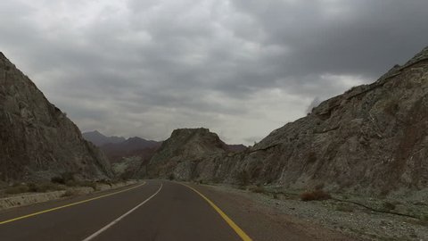 Moving on Road between Fujairah
Mountains Rocks POV Point of View 4K Video UAE