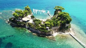 Aerial drone view video of famous islet of Cameo in Agios Sostis area of Laganas, Zakynthos island, Ionian Greece
